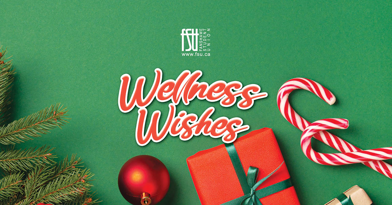 Festive arrangement with a red gift box tied with green ribbon, candy canes, a red ornament, and pine branches on a green background with Wellness Wishes text.