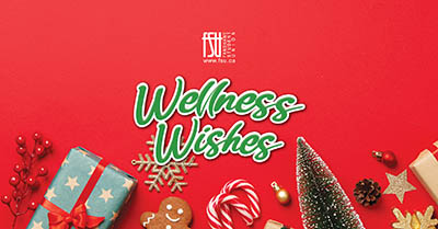 Festive holiday scene with wrapped gifts, candy canes, gingerbread cookie, and Christmas tree on a red background with Wellness Wishes text.