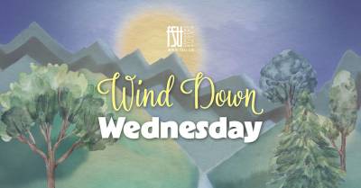 Serene landscape with trees and mountains under a glowing sun, featuring the text Wind Down Wednesday.