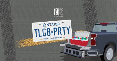 Ontario license plate reading TLG8 PRTY mounted on a black pickup truck with an open cooler filled with drinks in the truck bed.