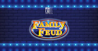 Bright yellow and orange Family Feud logo glowing against a dark blue brick wall with blue stage lights above and below.