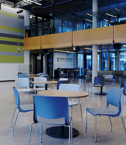 A portion of Forwell Hall at Fanshawe College is shown, including a table and chairs.