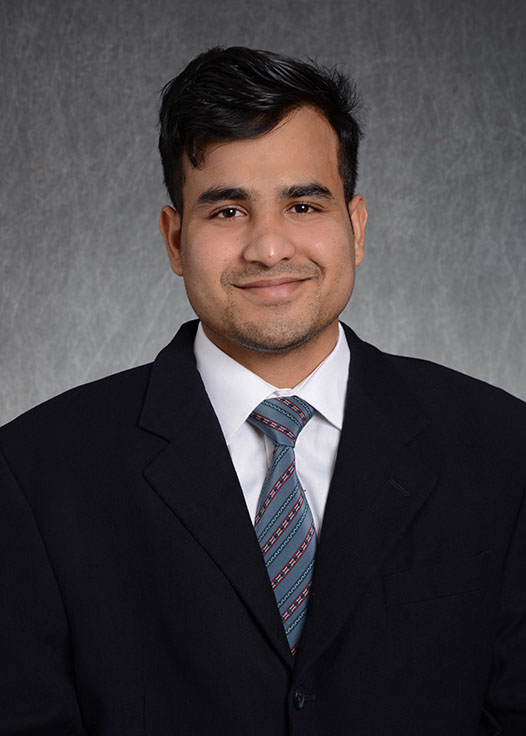 A headshot of Avnish Kumar Choudhary in front of a grey background.